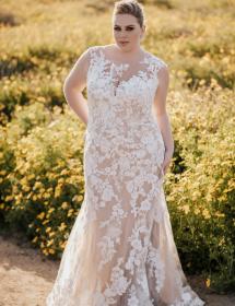 Plus size model in an Allure style 1161 wedding gown