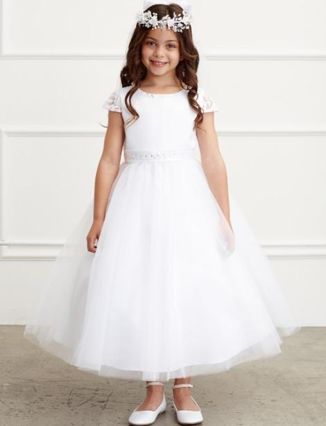 Small girl modeling a white flower girl dress