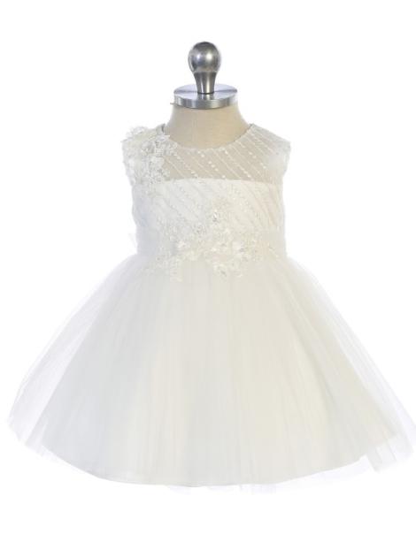Flower girl dress with puffy skirt is being modeled on a headless mannequin