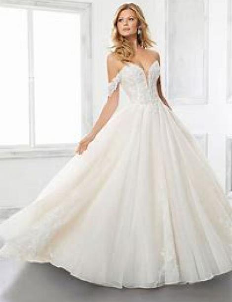 Image of woman strutting her stuff in a dreamy wedding dress