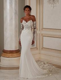 Model in front of column wearing a stunning wedding dress Morilee 2615