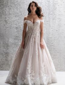 Beautiful model modeling a fantastic wedding dress with exquisite lace