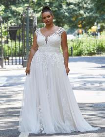Plus Size Model wearing a wedding dress