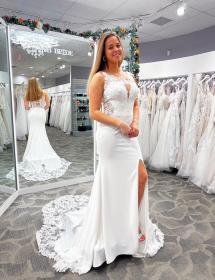 Great looking model wearing Maja Bella wedding dress in front of the tri mirror at MB Bride near Pittsburgh PA